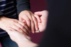 feminine-hand-holding_925x